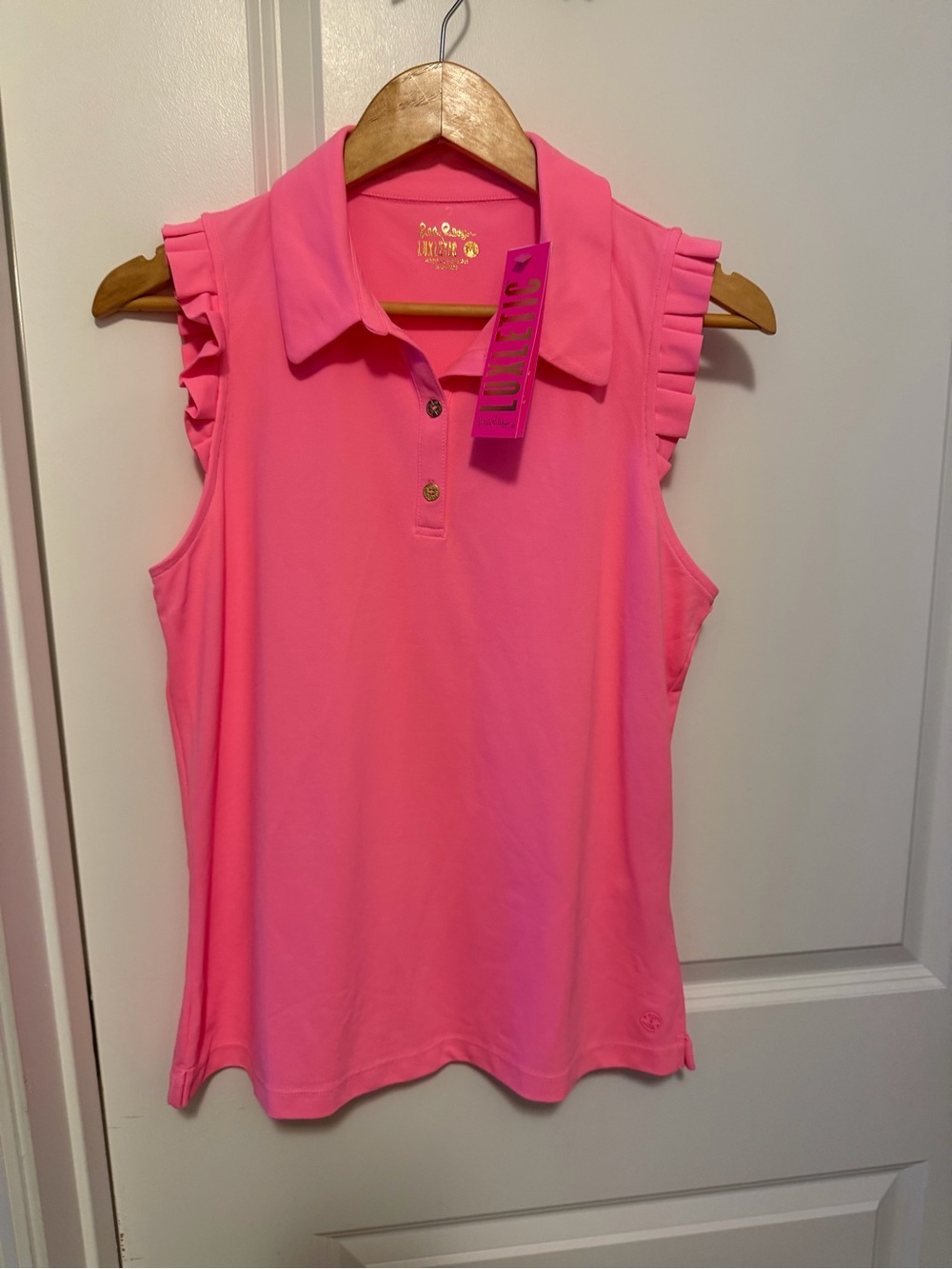 Lilly Pulitzer Luxletic Frida sleeveless ruffle Polo. Lilly’s coral
